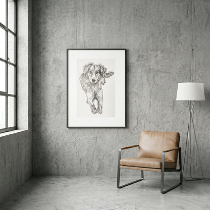 A modern living room mockup featuring a framed custom pet portrait by Silvana Varriale hanging on a concrete wall above a leather chair.