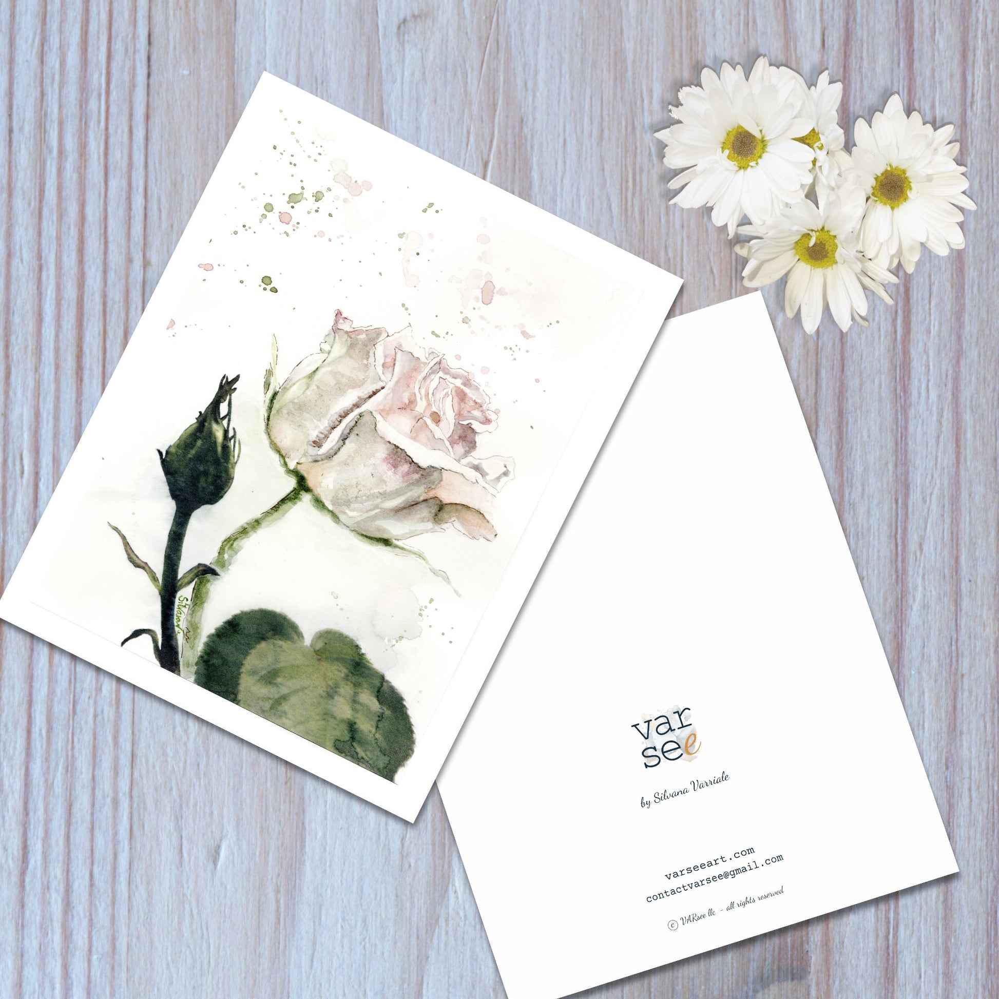 Front and back view of a light pink rose watercolor art greeting card.