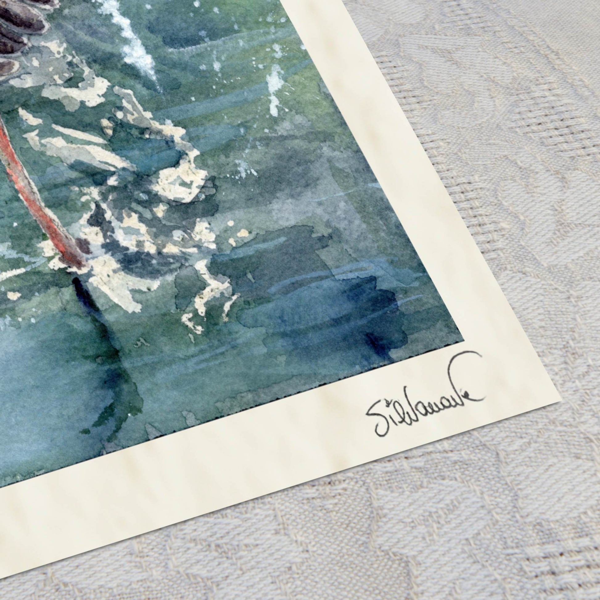 Giclée print corner detail of the artist's signature on archival Hahnemühle paper edge. The print is "wingspan airlines" by Silvana Varriale of VARsee Art.