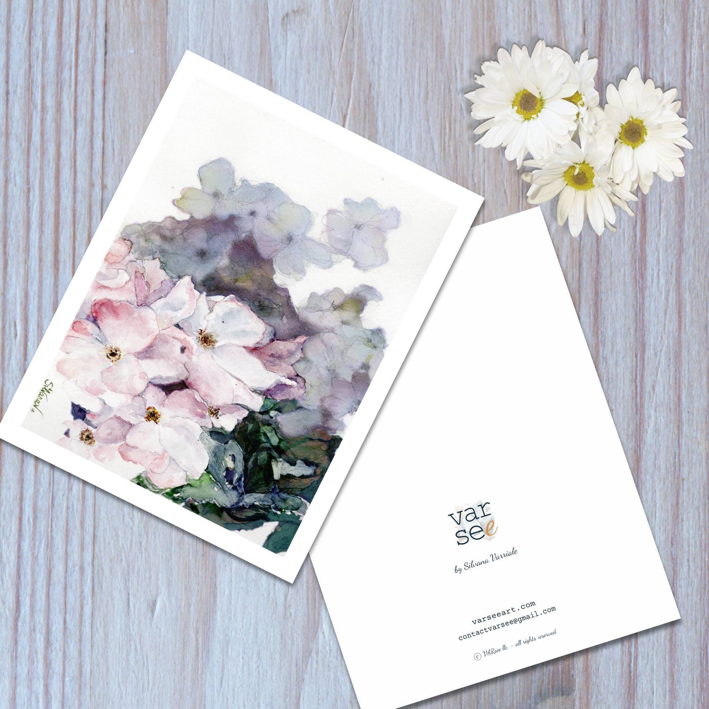 Front and back view of a wildroses watercolor art greeting card.